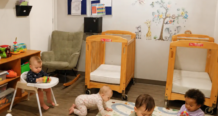 Infants and toddlers playing in the classroom at Planet Learning Academy